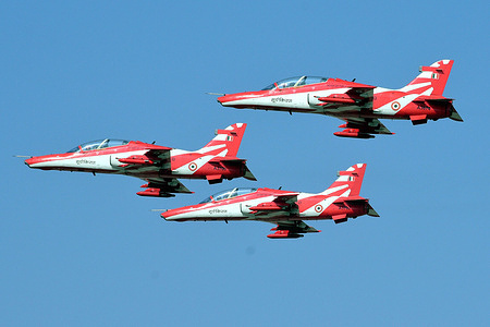 Indian Air Forces (IAF) ‘Surya Kiran’ aerobatic team performs at Nal Air Force station.