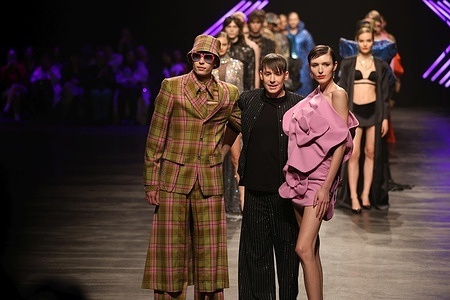 The photo shows models with designer Kilian Kerner new collection on the catwalk at the Verti Music Hall.