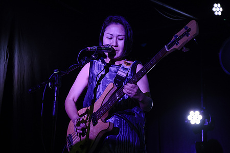 Satomi Matsuzaki of Deerhoof band performing live on stage of Monk Club