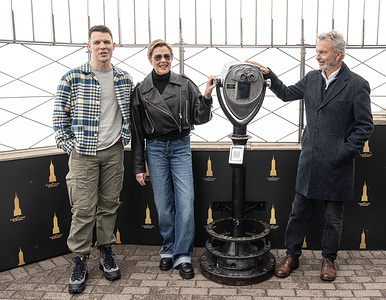 Jake Lacy, Annette Bening, Sam Neill visit Empire State Building in New York to celebrate series premiere of Peacock's 'Apples Never Fall'.