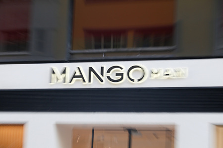 Oviedo, Spain, March 12th, 2024: The Mango Men sign at the entrance of a store during Mango prepares to open 500 stores by 2026, on March 12, 2024, in Oviedo, Spain.