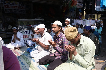 Muslims offer prayers on the first Friday of the holy month of Ramadan at Near Tipu Sultan Masjid in Kolkata.