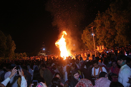 Hindu peoples burns holi, a religious moment during the celebration of Holi festival, spring festival of colors in Hyderabad in which they put colors on each other