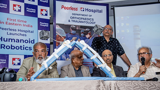 Peerless Hospital .......the Multi-Speciality, leading Corporate Hospital of Kolkata & Eastern India has launched latest break-through technology named Humanoid Robotics for the First Time in Eastern India for Hip, Knee and Shoulder replacement with 3D Robotics, AI Platform and Mixed Reality with Hololens powered by Microsoft in orthopedic surgery on 4th April, 2024 with a press conference at a leading hotel in Kolkata,India. 
The Press Meet was addressed by -
Dr. Sujit Kar Purkayastha, Managing Director, Dr. V. R. Ramanan, Medical Director and Mr. Ravindra Pai, Dy Managing Director from Top Management Team and Dr. Somnath De, Clinical Director, Dr. Swarnendu Samanta, Sr. Consultant, Dr. Nikhilesh Das, Sr. Consultant and Dr. Sudipta Mukherjee, Sr. Consultant from Department of Orthopaedics and Traumatology, Peerless Hospital