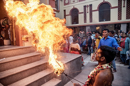 Devotees celebrate Shiva Gajon Hindu festival at Kolkata.